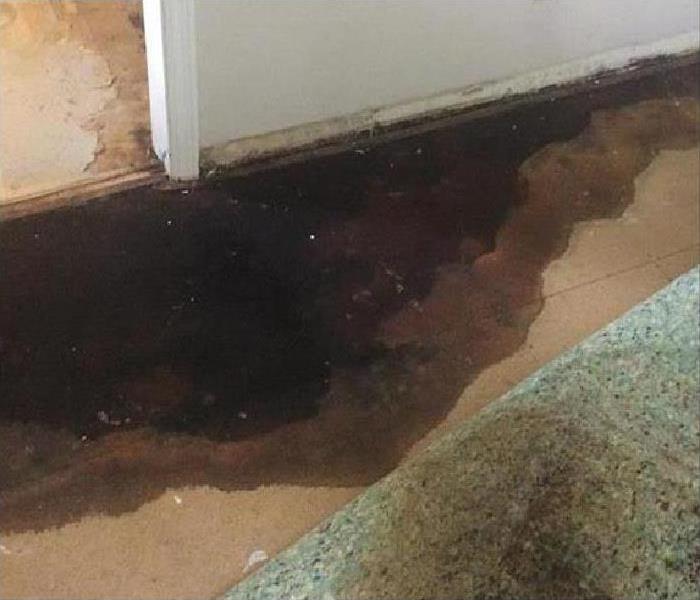 water leak caused damage to flooring